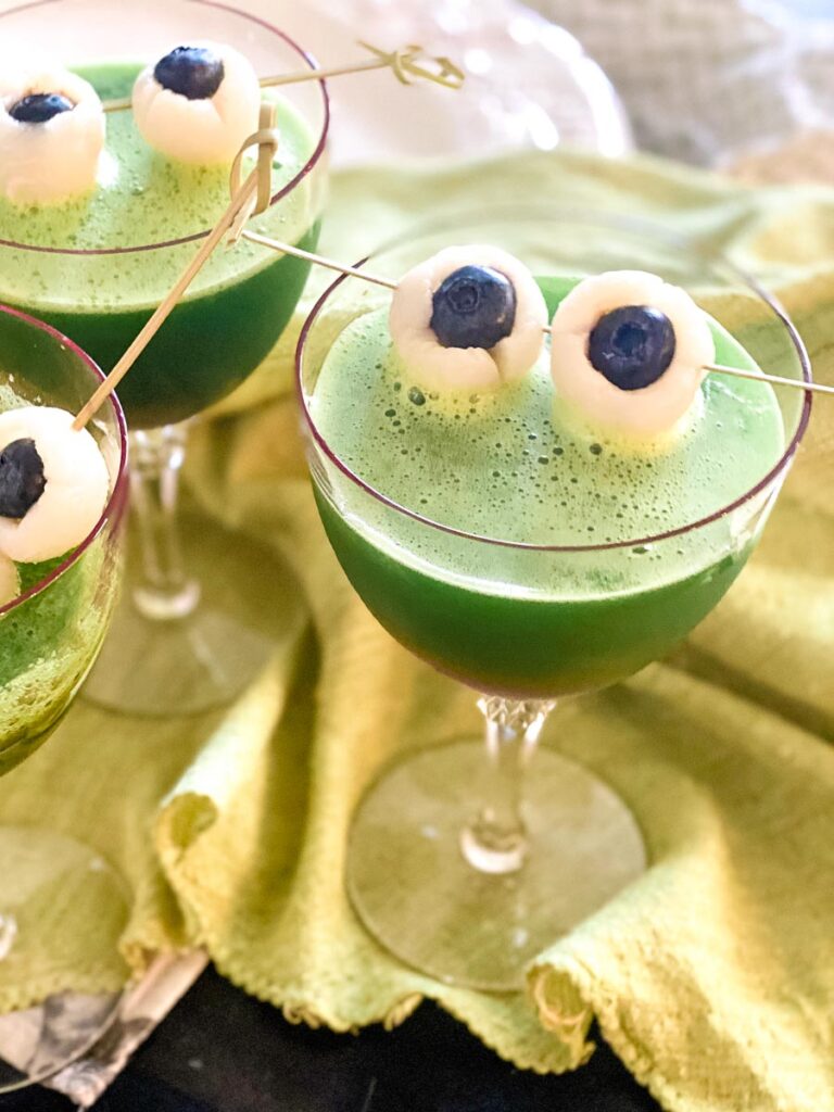 Green juice with lychee "eyeballs" garnish. 