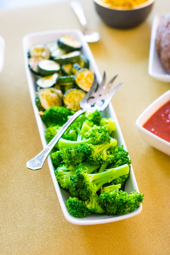 Small platter of broccoli and roasted zucchini. 
