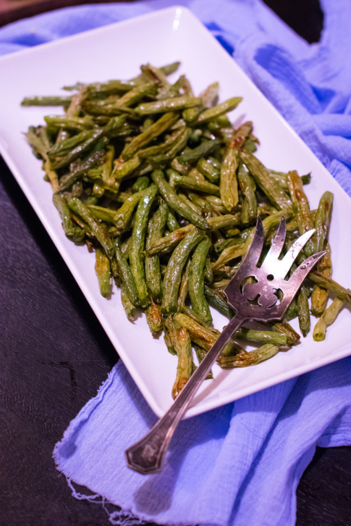 Platter of crispy roasted green beans. 
